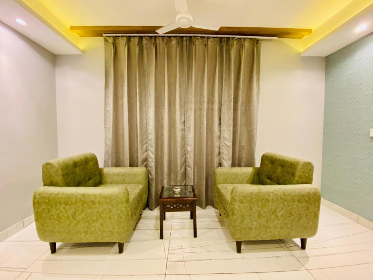 The Eleganza Hotel Jhajra Bagian luar foto