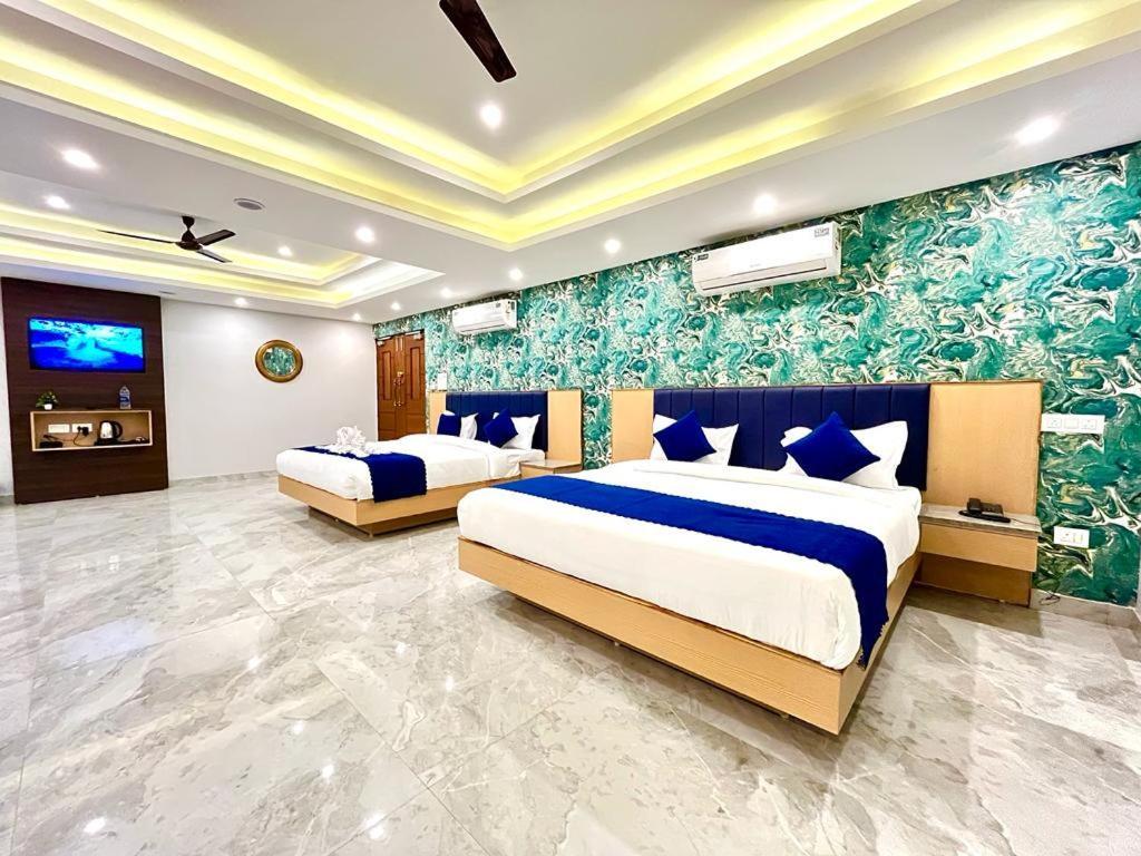 The Eleganza Hotel Jhajra Bagian luar foto